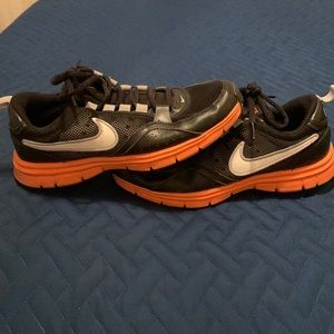 Black and orange Nike running shoes